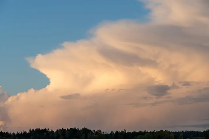 Cumulus clouds at sunset over the fields in Brastad 3